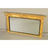 AN EARLY 19TH CENTURY GESSO AND GILTWOOD OVERMANTEL MIRROR, the inverted breakfront pediment with