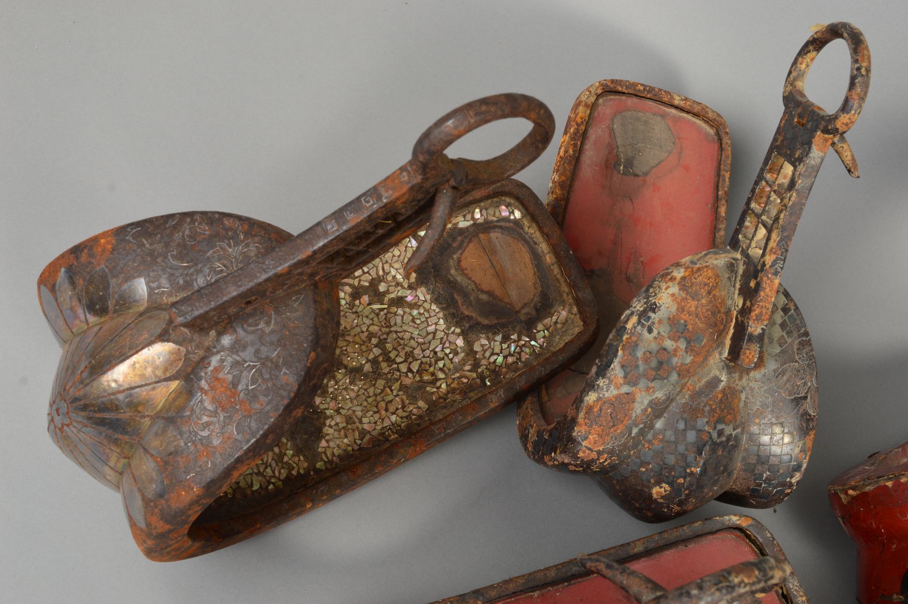 THREE PAIRS OF METAL AND RED LACQUERED ASIAN STIRRUPS, together with two other Persian stirrups - Image 6 of 12