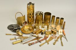 A COLLECTION OF WWI ERA TRENCH ART ITEMS, including shell cases with cut out designs around the rim,