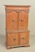 AN 18TH/19TH CENTURY CONTINENTAL WALNUT CABINET ON CHEST, the moulded cornice above an egg moulded