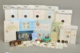 A BOX CONTAINING ROYAL MINT AND BEATRIX POTTER RELATED ITEMS, to include six Royal Mint packs of