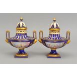 A PAIR OF 19TH CENTURY SEVRES STYLE POT POURRI VASES AND COVERS, of oval form, blue and gilt domed