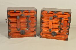 A PAIR OF 20TH CENTURY KOREAN METAL MOUNTED STAINED SOFTWOOD CHESTS, each fitted with an arrangement