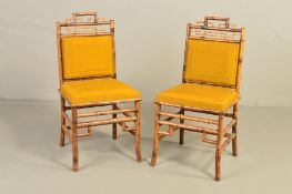 A PAIR OF LATE 19TH CENTURY BAMBOO SIDE CHAIRS, later upholstered in mustard yellow silk to backs