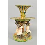 A LATE 19TH CENTURY JOSE A. CUNHA MAJOLICA CENTREPIECE, the trumpet shaped central vase above a