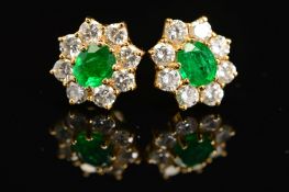 A PAIR OF LATE 20TH CENTURY EMERALD AND DIAMOND STUD EARRINGS, post and scroll fittings, emeralds