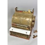 A NATIONAL CASH REGISTER, cast body with Art Nouveau style decoration, appears to be complete and in