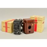 A ROLLEICORD VB TLR CAMERA, with original box and packaging and a seemingly unused and boxed leather
