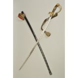 A WWII ERA 3RD REICH OFFICERS SWORD AND SCABBARD, the design is the 'Lions Head' style with red