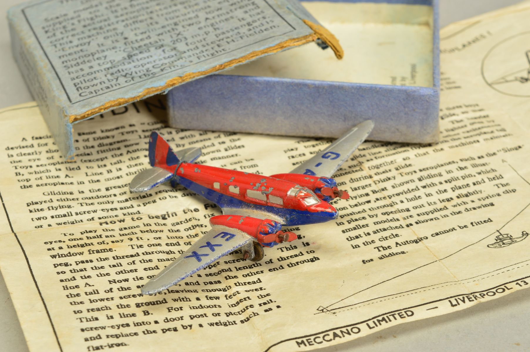 A BOXED DINKY TOYS THE KING'S AEROPLANE, No.62k, Airspeed 'Envoy' red and blue fuselage and engines, - Image 2 of 5