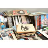 A TRAY CONTAINING OVER ONE HUNDRED AND TWENTY L.P'S AND 12'' SINGLES, mostly from the 1980's,
