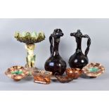 A GROUP OF ASSORTED GLAZED CERAMICS, including a pair of dark brown glazed pottery ewers with