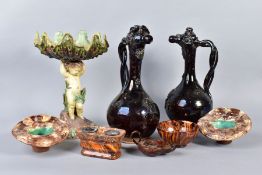 A GROUP OF ASSORTED GLAZED CERAMICS, including a pair of dark brown glazed pottery ewers with