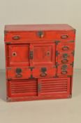A 20TH CENTURY KOREAN RED PAINTED AND IRON BOUND CABINET, fitted with a long drawer above an