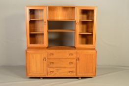 AN ERCOL BLONDE ELM WINDSOR SIDEBOARD/BOOKCASE, model 455D, the top section flanked by two glazed