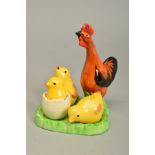 A CLARICE CLIFF BIZARRE NOVELTY CRUET SET IN THE FORM OF A HEN AND THREE CHICKS, bears 'Wilkinson