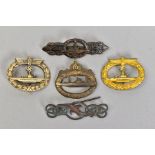 FIVE BADGES AND CLASPS, of German WWII Kreigsmarine U boat interest consisting of gold coloured U