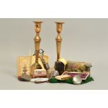 A PAIR OF LATE 18TH CENTURY ADAM STYLE CAST BRASS CANDLESTICKS, fluted and beaded decoration, bear