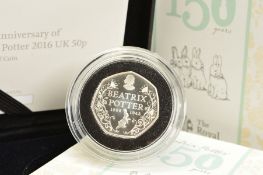 A BOXED ROYAL MINT 2016 BEATRIX POTTER BOXED 150TH ANNIVERSARY SILVER PROOF FIFTY PENCE COIN, with