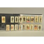 A COLLECTION OF TWO HUNDRED AND NINETY FIVE CIGARETTE CARDS IN ONE ALBUM, containing mainly