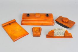 A GROUP OF FIVE ART DECO CARVACRAFT DESK ACCESSORIES IN BUTTERSCOTCH AMBER BAKELITE, comprising a