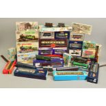 A QUANTITY OF BOXED AND UNBOXED OO GAUGE MODEL RAILWAY LOCOMOTIVES AND ROLLING STOCK, including a