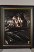 ROB HEFFERAN (BRITISH 1968), 'The City By Night', a study of two lovers in a classic car, oil on