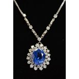 AN IMPRESSIVE LARGE SAPPHIRE AND DIAMOND CENTRE PIECE NECKLET, centring on a principal oval mixed
