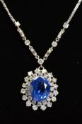 AN IMPRESSIVE LARGE SAPPHIRE AND DIAMOND CENTRE PIECE NECKLET, centring on a principal oval mixed