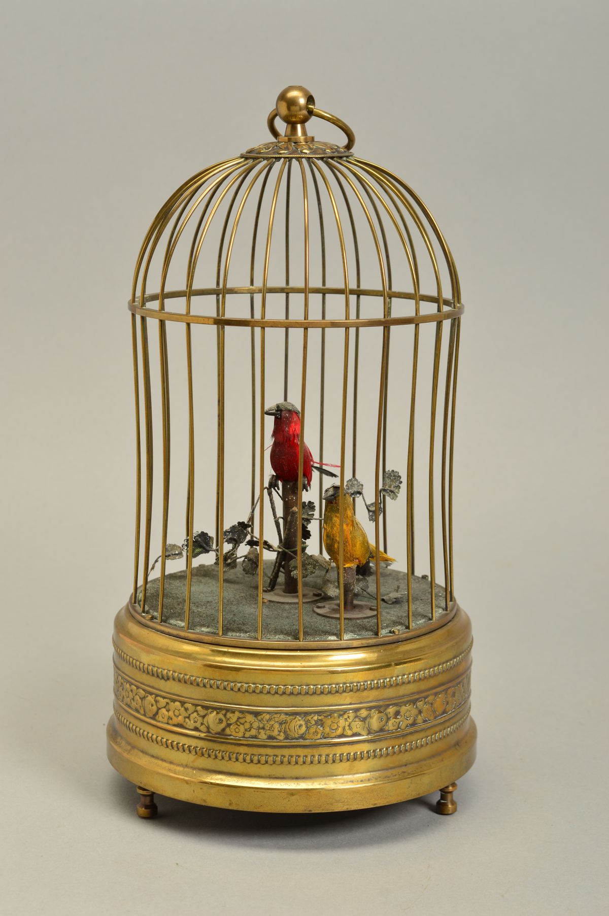 AN EARLY 20TH CENTURY CLOCKWORK AUTOMATON OF TWO BIRDS IN A BRASS CAGE, both birds sing and move - Image 2 of 6