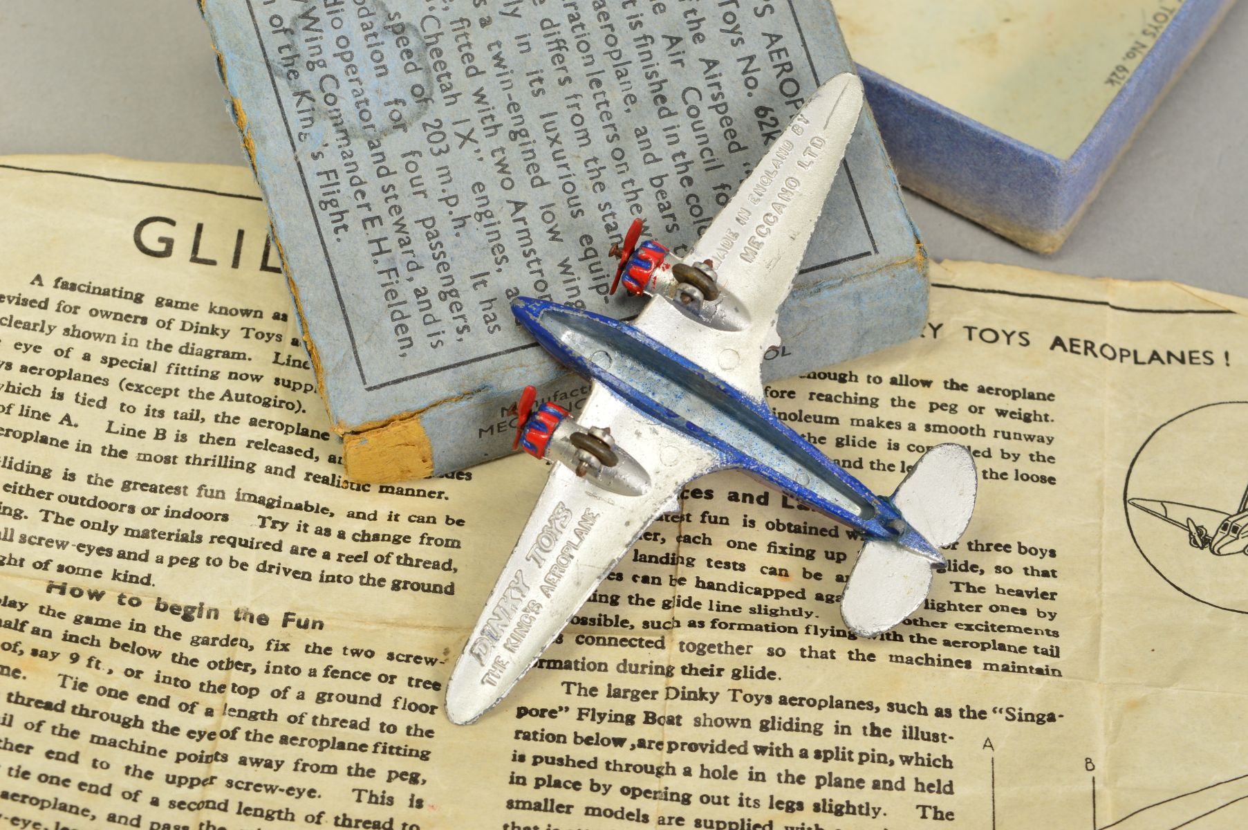 A BOXED DINKY TOYS THE KING'S AEROPLANE, No.62k, Airspeed 'Envoy' red and blue fuselage and engines, - Image 4 of 5