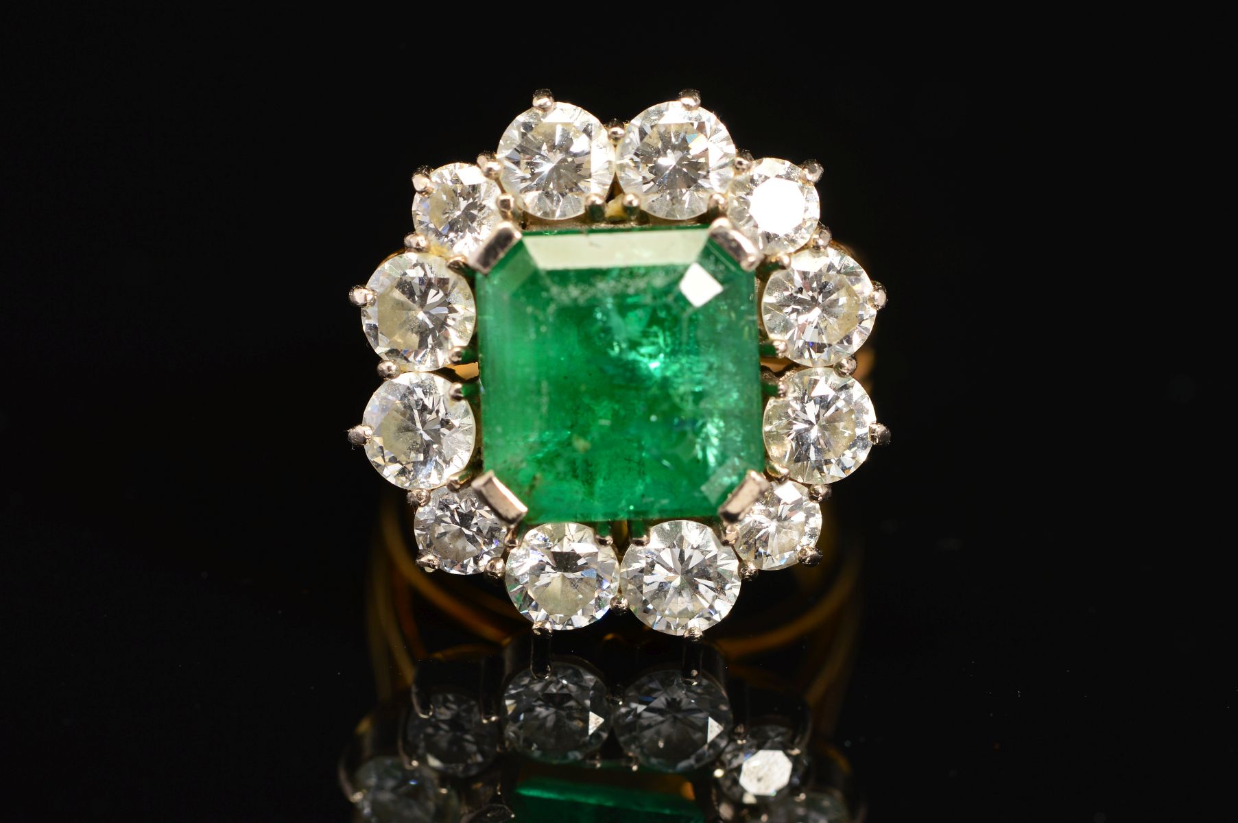 A LATE 20TH CENTURY LARGE EMERALD AND DIAMOND CLUSTER RING, emerald cut emerald measuring - Image 2 of 5