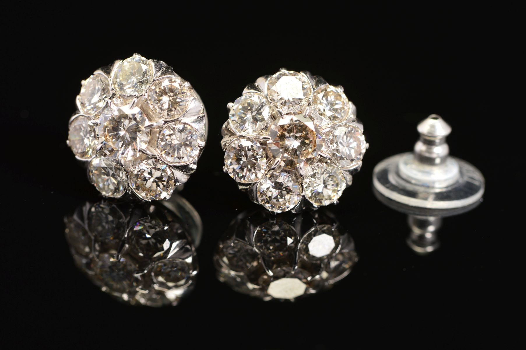 A PAIR OF MODERN DIAMOND ROUND CLUSTER EAR STUDS, post fittings, round brilliant cut diamonds