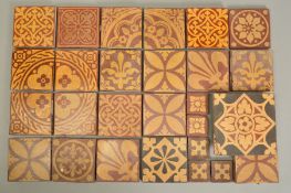 A COLLECTION OF APPROXIMATELY NINETY ASSORTED VICTORIAN TERRACOTTA AND BUFF TERRACOTTA ENCAUSTIC