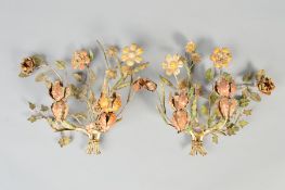 A PAIR OF EARLY 20TH CENTURY PAINTED WROUGHT IRON GIRANDOLES, in the form of sprays of flowers