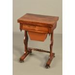 AN EARLY VICTORIAN ROSEWOOD GAMES AND WORK TABLE, the rectangular fold over swivel top with inlaid