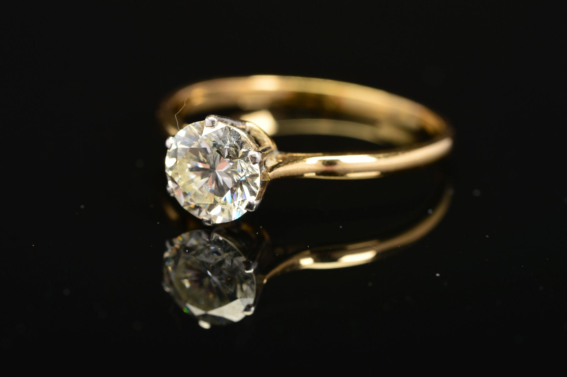 A MODERN SINGLE STONE DIAMOND RING, estimated modern round brilliant cut diamond weight 1.50ct,