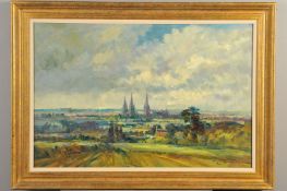 IVAN TAYLOR (BRITISH 1946), 'Lichfield Sunshine', a view of Lichfield from the West, the Cathedral