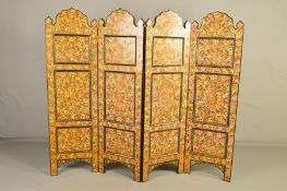 A 20TH CENTURY PAINTED PAPER LAID ON WOOD PERSIAN STYLE FOUR FOLD SCREEN, arched tops, foliate