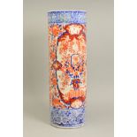A LATE 19TH CENTURY JAPANESE IMARI POTTERY CYLINDRICAL STICK STAND, foliate decoration between two