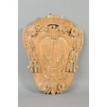 A 19TH CENTURY CARVED WOOD ARMORIAL PLAQUE, of cartouche shape, featuring knotted rope with