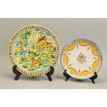 A 19TH CENTURY MAIOLICA CHARGER, painted with a border of blue and yellow dots, the centre with a