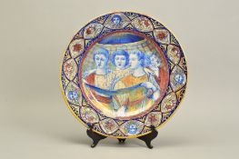 A LATE 19TH CENTURY CONTINENTAL HAND PAINTED MAIOLICA LUSTRE CHARGER, the circular rim decorated