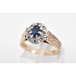 A MODERN SAPPHIRE AND DIAMOND OVAL CLUSTER RING, ring size N1/2, hallmarked 9ct gold, London,