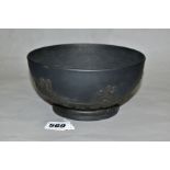 A LATE 18TH CENTURY LEEDS POTTERY BLACK BASALT FOOTED BOWL, applied with band of classical figures