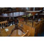 A GEORGIAN AND LATER MAHOGANY CIRCULAR TILT TOP TRIPOD TABLE together with an Edwardian octagonal