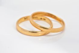 TWO 22CT GOLD WEDDING BANDS, both approximately 2.5mm wide, first hallmarked Birmingham 1928, ring