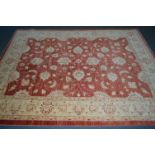 A LARGE LATE 20TH CENTURY 100% WOOLLEN FLORAL GOLD AND RED GROUND CARPET SQUARE, 350cm x 274cm