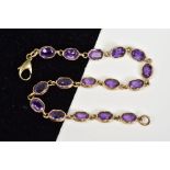 A 9CT GOLD AMETHYST SET BRACELET, designed with sixteen oval cut amethyst links within collet mounts