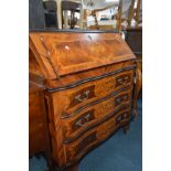 A REPRODUCTION ROSEWOOD AND FOLIATE INLAID FINISH ITALIAN BUREAU with a fitted interior and three
